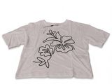 a white t - shirt with a flower design on the front