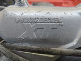 a close up of a motorcycle engine with a number on it