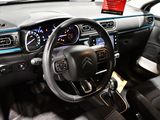 the interior of a car with a steering wheel, dashboard, and dash board