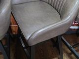 two chairs that are sitting next to each other on the floor