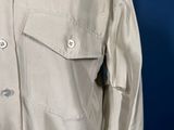 a close up of a shirt on a mannequin mannequin mannequin mannequin mannequin mannequin mannequin mann