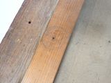 a close up of a piece of wood on the ground