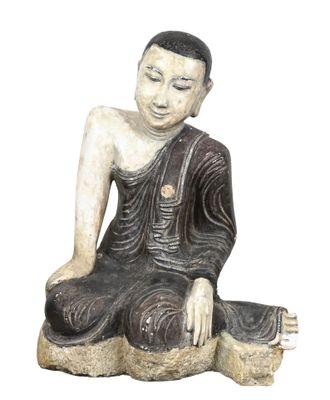 buddha statue sitting on a rock on a white background