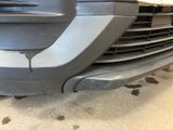 a close up of the front bumper of a car