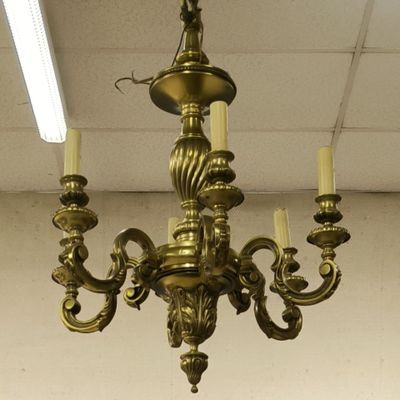 a chandelier that is hanging from the ceiling
