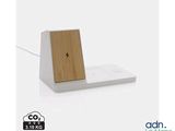 a wooden clock on top of a white charging dock