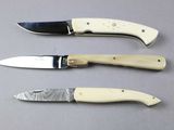 three different types of knives that are on the table