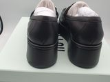 they are two pairs of shoes that are on top of a box