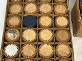 a box of cupcakes that are sitting on a table