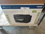 a box with a printer on top of it on a cart