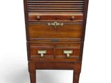 an image of a wooden chest of drawers