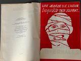 an open book with a picture of a woman ' s face on it