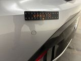 a close up of a sticker on the front of a car