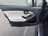 a car door with the door handle open and the door handle open