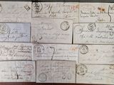 many old envelopes on the table with stamps on them