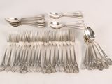 a lot of spoons and spoon spoons on the table