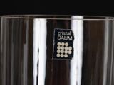 a close up of a glass with a sticker on it