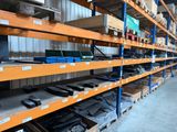 a lot of shelves that have many different types of electronic equipment on them