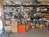 many boxes and boxes on the shelves in the room
