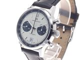 a close up of a watch on a white background