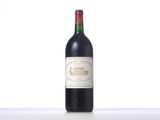 a bottle of wine that is sitting on a table