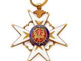 gros plan d'une médaille sur fond blanc