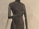 chanel bag on a mannequin stand