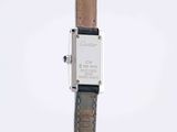 an image of a wrist watch with a leather strap and a silver case