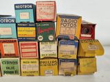a pile of old radio boxes stacked on top of each other
