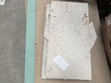 a box with a piece of paper sitting on top of it