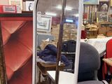 an image of a mirror in a store with other items