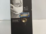 a box with a picture of a man shaving his face