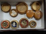 a box filled with different types of wooden bowls