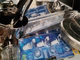 many pots and pans that are on the kitchen counter