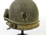 an image of a helmet on a stand on a white background