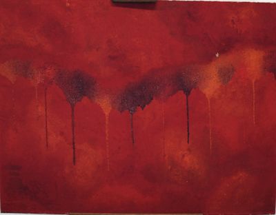 une image représentant un tableau rouge recouvert de peinture noire