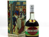 a bottle of cusinner cusinner next to a box