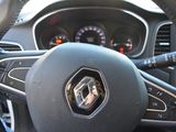 the steering wheel of a car with a steering sticker on it