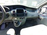a dashboard of a car with a steering wheel and dashboard controls