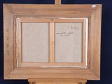 an old picture of a wooden easel with a piece of fabric on it