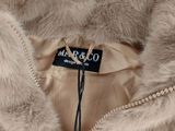L'étiquette sur la veste indique « Mar & Co ».