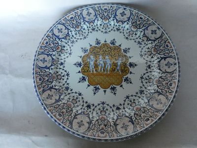 a plate with a picture on it sitting on a table