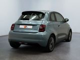 an image of a small car parked in a showroom