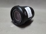 an image of a close up of a camera lens on a table