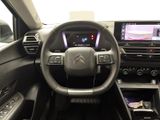 the interior of a car with a steering wheel, dashboard, and dash board
