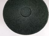 a black hat sitting on top of a white table