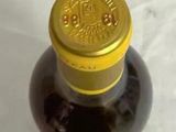 a bottle of wine that is sitting on a table