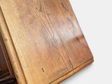 an old wooden table with a drawer underneath it on a white surface