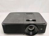 an image of a projector sitting on top of a white table