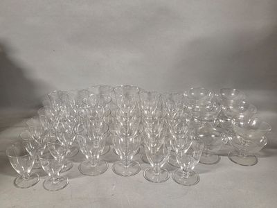 a lot of empty wine glasses sitting on a table